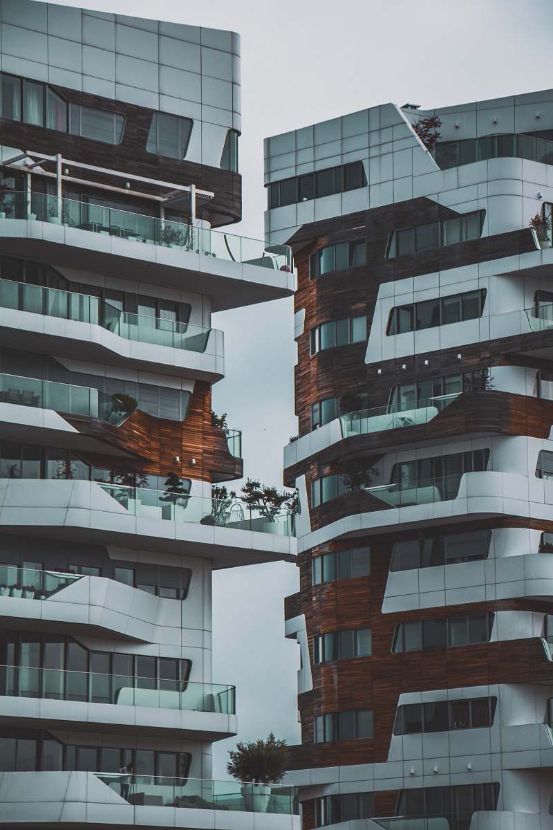 high rise white high rise building town